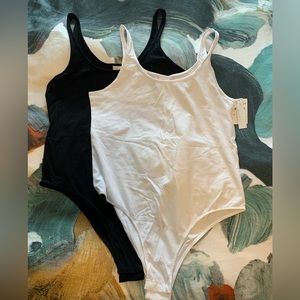Abound bodysuits. Black and White. Size XL. New with tags